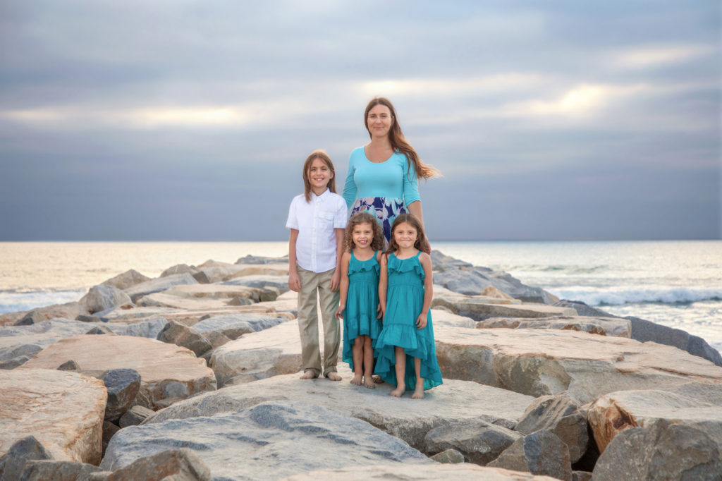 Family on South Ponto Beach Jetty in Carlsbad